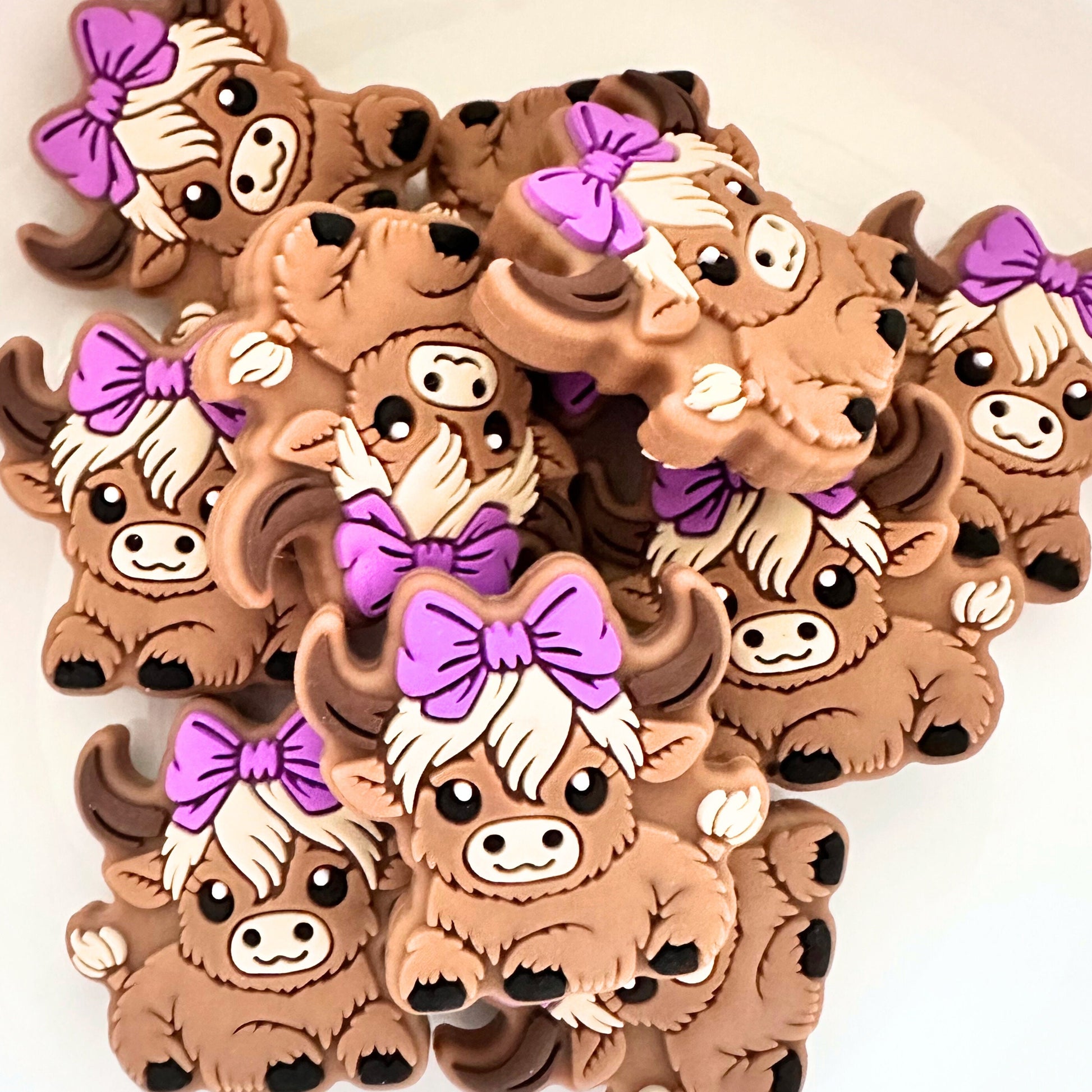 Baby Highland Cow W/ Purple Bow image 0