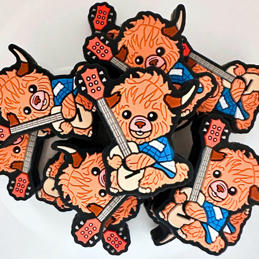 Baby Boy Highland Cow Playing Guitar image 0