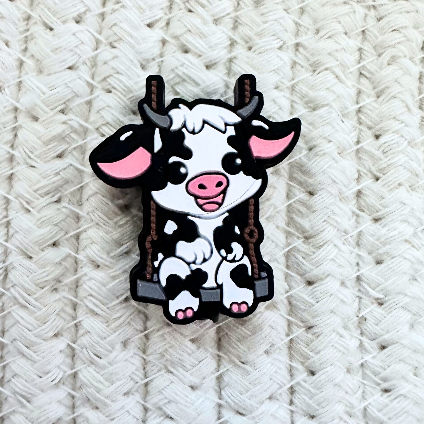 Baby Cow On Swing image 1