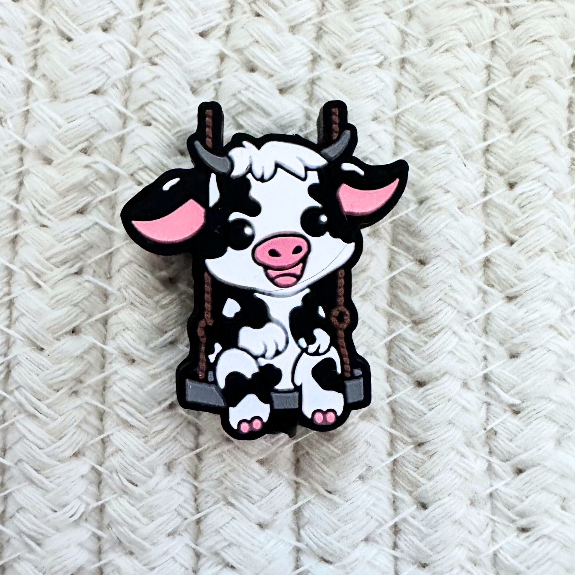 Baby Cow On Swing image 1