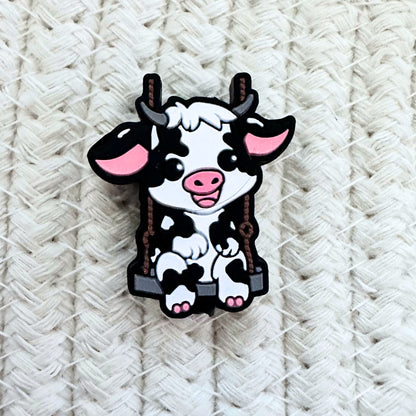 Baby Cow On Swing image 1